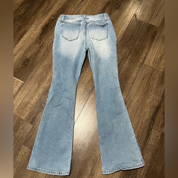 Light Blue Flare Jeans with Subtle Fading - Picture 4 of 5